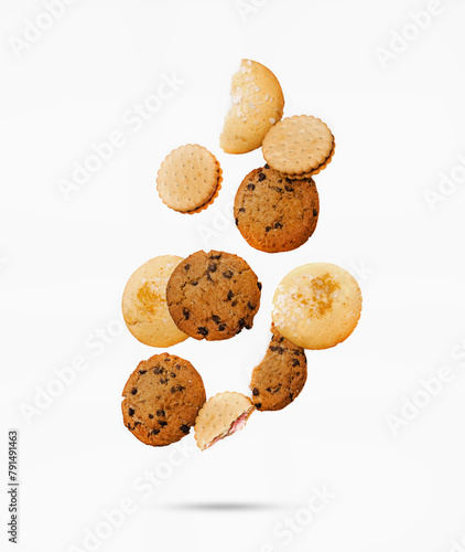 Flying assortment of various cookies on a white isolated background