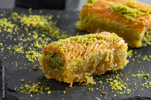 Delicious Turkish dessert pistachio kadayif. Burma kadayıf	 photo