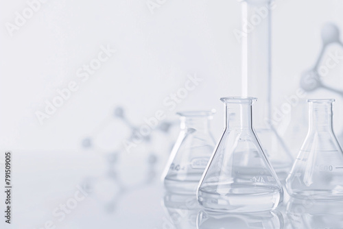 Laboratory glassware on a white background with soft shadows