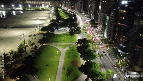 Aerial footage of Av. Pres. Wilson - Jose Menino at night in Santos city, Sao Paulo, Brazil photo