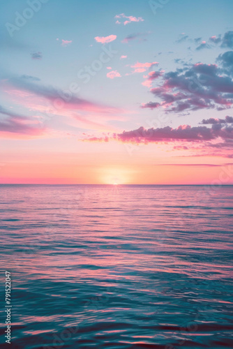 Serene beauty of a minimalist sunset  with a gradient of warm colors filling the sky above a tranquil horizon.
