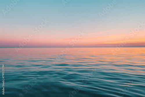 Serene beauty of a minimalist sunset, with a gradient of warm colors filling the sky above a tranquil horizon.