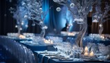 A charity gala event with elegant soft blue lighting and table settings, creating a soothing atmosphere that encourages generous donations