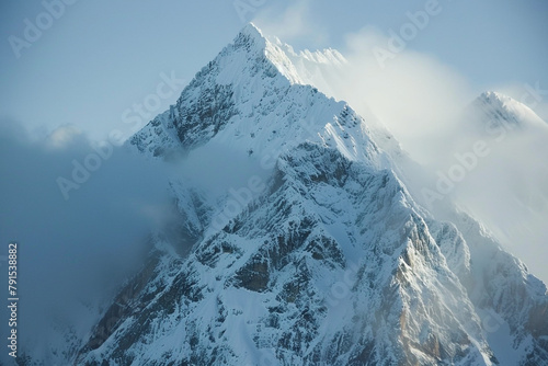 A close-up shot of a rugged mountain peak, showcasing its untamed beauty.