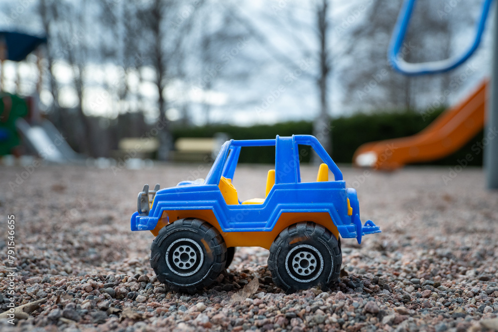 close up of suv style toy car at playground close up of suv style toy car at playground