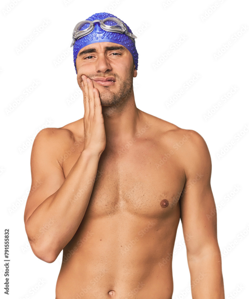 Young Hispanic man with swim gear having a strong teeth pain, molar ache.