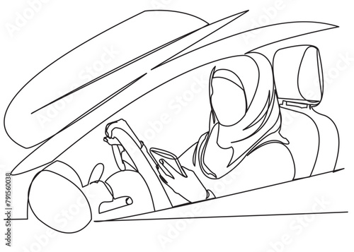 muslim woman driving a car