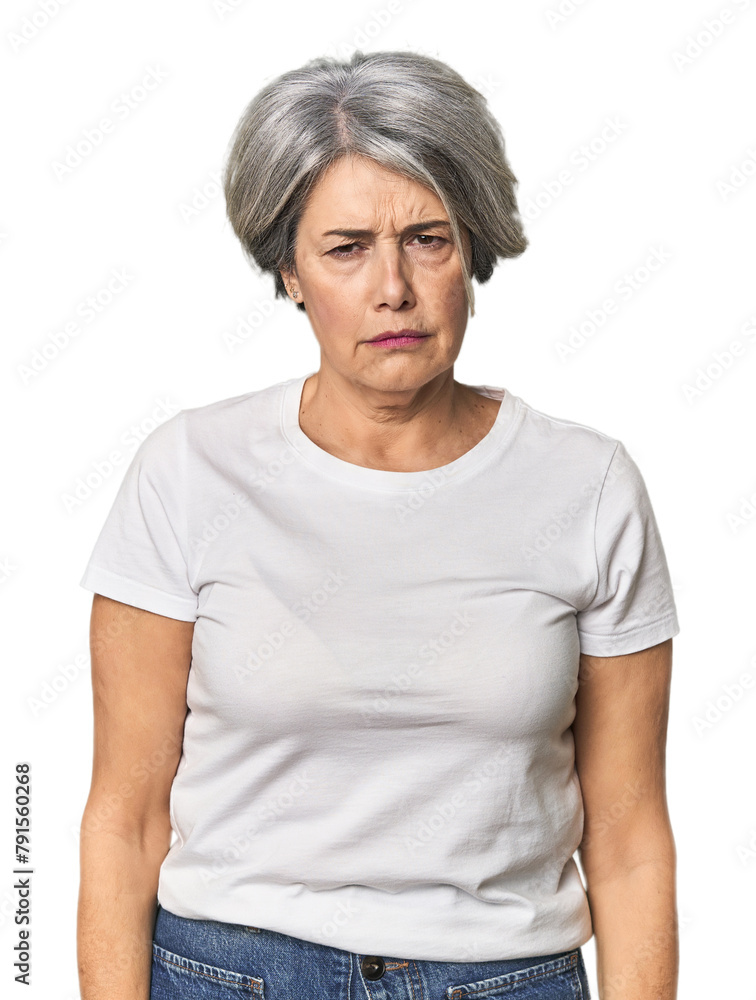Caucasian mid-age female on studio background sad, serious face, feeling miserable and displeased. Caucasian mid-age female on studio background sad, serious face, feeling miserable and displeased.