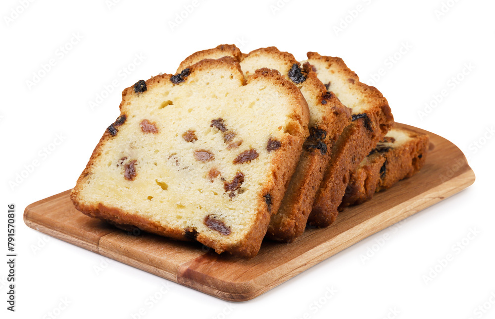 Cupcake with raisins cut into pieces on a wooden board on a white background. Isolated Cupcake with raisins cut into pieces on a wooden board on a white background. Isolated