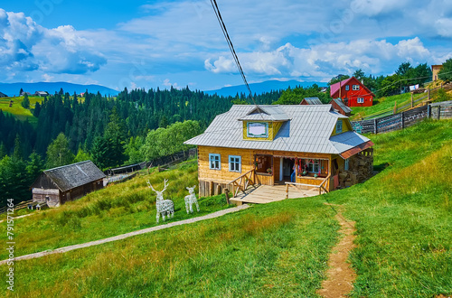 The wooden Hutsul house, Mountain Valley Peppers handicraft village, Ukraine photo