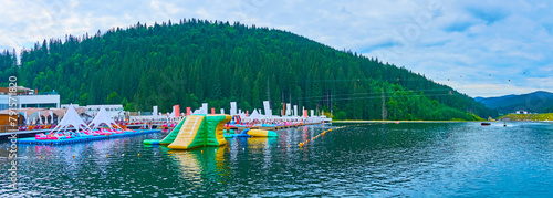 Molodist Lake of Bukovel mountain resort, Carpathians, Ukraine photo