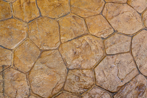 Stone surface made of artificial uneven tiles.