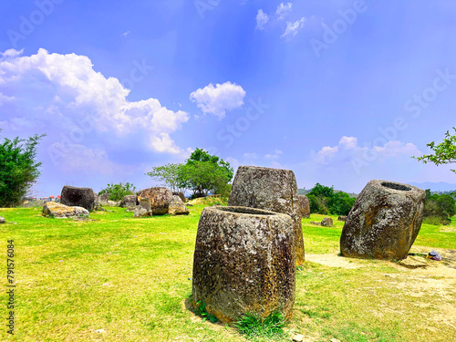 The Plain of Jars is considered the most distinctive and enigmatic of all Laos attractions. The large area around Phonsavan, the main city of Xieng Khouang Province is dotted with stone jars. photo