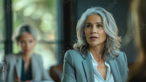 Confident Senior Businesswoman Giving Presentation