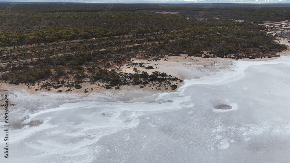 Aerial view of a road and a salt lake in Western Australia