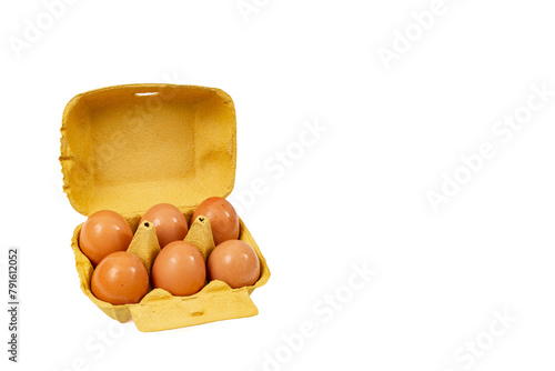 6 eggs yellow carton pack,  isolated on white background, with negative space
