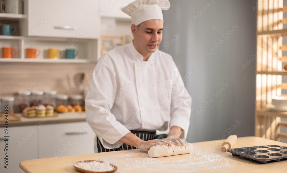 Professional chef kneads dough with expertise. Art of bread-making in a bustling commercial kitchen Professional chef kneads dough with expertise. Art of bread-making in a bustling commercial kitchen