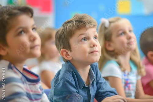 Children listen attentively to the teacher in the classroom