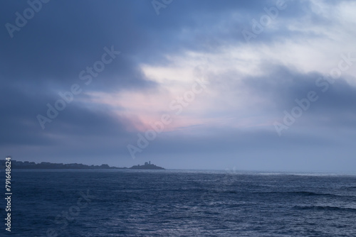 Sunrise over the ocean waves