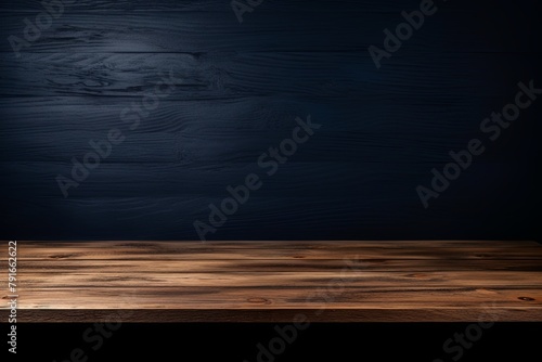 Abstract background with a dark navy blue wall and wooden table top for product presentation  wood floor  minimal concept  low key studio shot