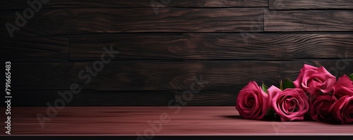 Abstract background with a dark rose wall and wooden table top for product presentation, wood floor, minimal concept, low key studio shot