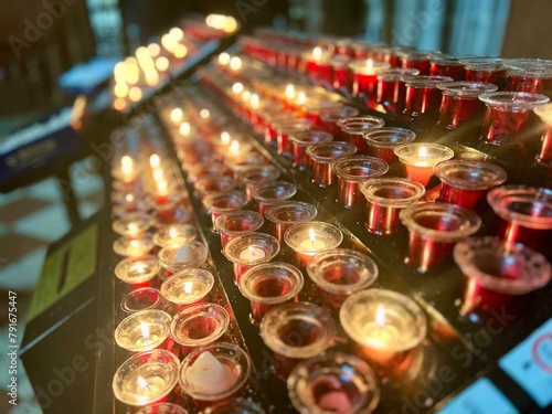 Lit candles in a church