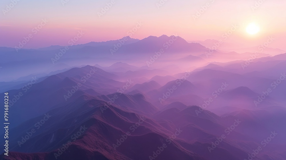 Serene Dawn Light Over Misty Mountain Range