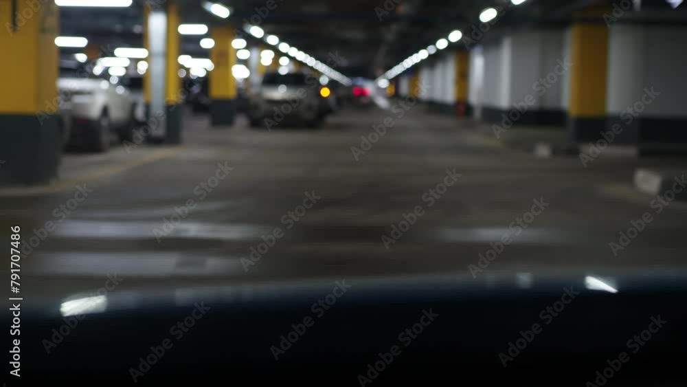 car ithe car is moving through an underground parking lot. blurred picture bokeh effect car ithe car is moving through an underground parking lot. blurred picture bokeh effect