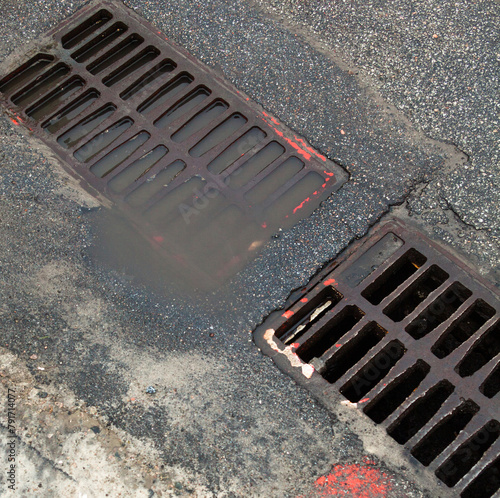 Drain grates on the road. photo