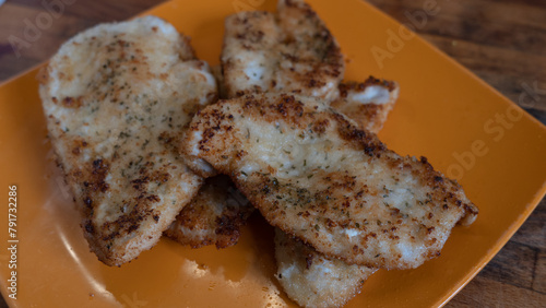 Plate with tarnished homemade chicken breast