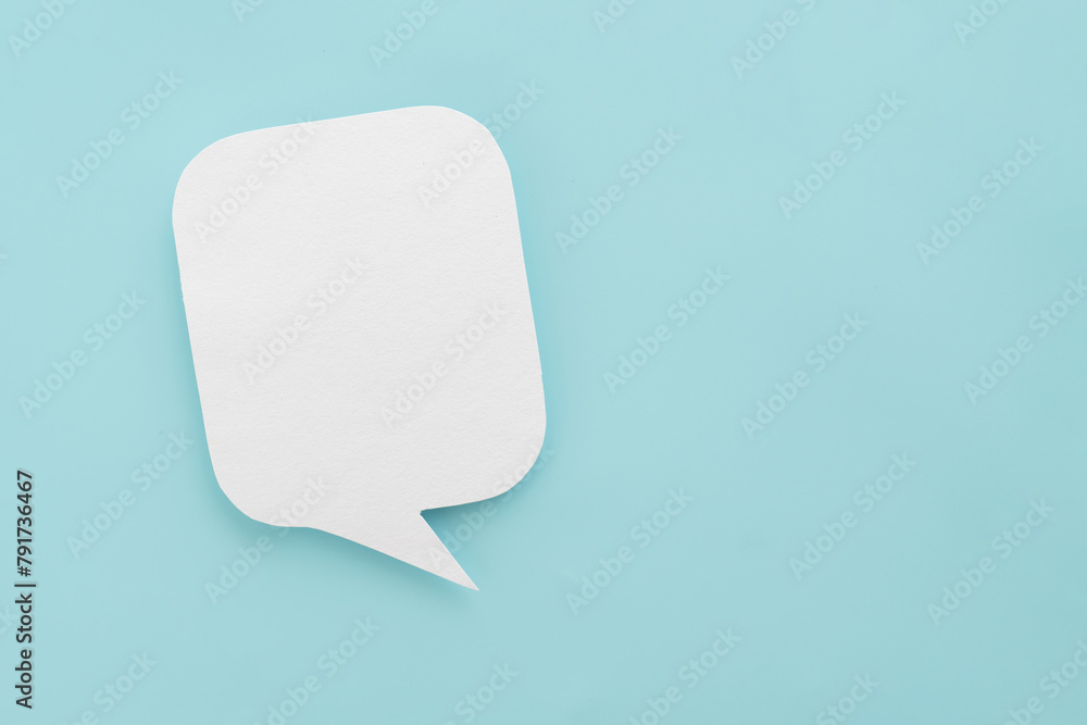 Conceptual image about communication and social media, customer feedback, real blank white speech bubble paper cut on grunge blue color background Conceptual image about communication and social media, customer feedback, real blank white speech bubble paper cut on grunge blue color background