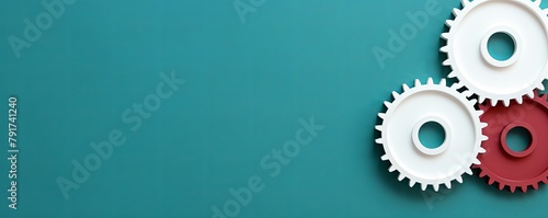 Three white gears on a Turquoise background, laid flat, copy space concept for business technology and development in the abstract vector with copy space for photo text or product, blank empty copyspa photo
