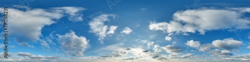 blue skydome with haze in 360 hdri panorama in equirectangular format with zenith and clouds and sun for use in 3d graphics or game development as skydome or edit aerial drone shot or sky replacement