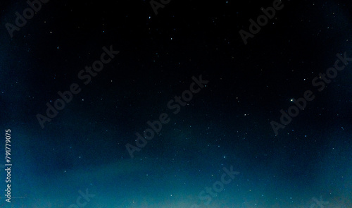 Blue dark night sky with many stars