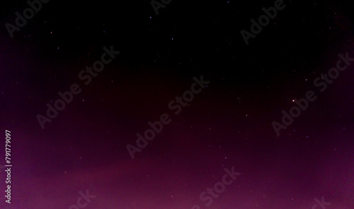 Pink dark night sky with many stars