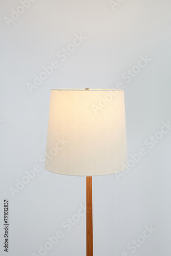 Beautiful vintage solid wood floor lamp. Interior product photograph.