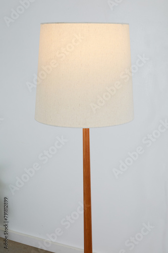 Beautiful vintage solid wood floor lamp. Interior product photograph.