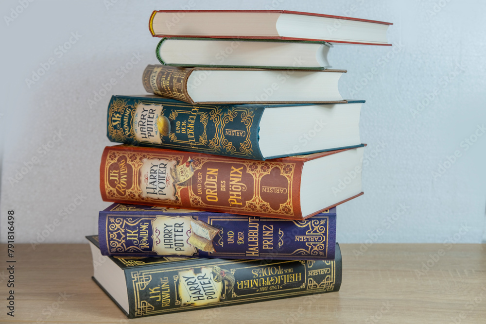 Fototapeta premium Magical Collection books Rowling Harry Potter, appealing to book lovers, Children's Entertainment, Friendship and Self-Discovery, Frankfurt - December 22, 2023