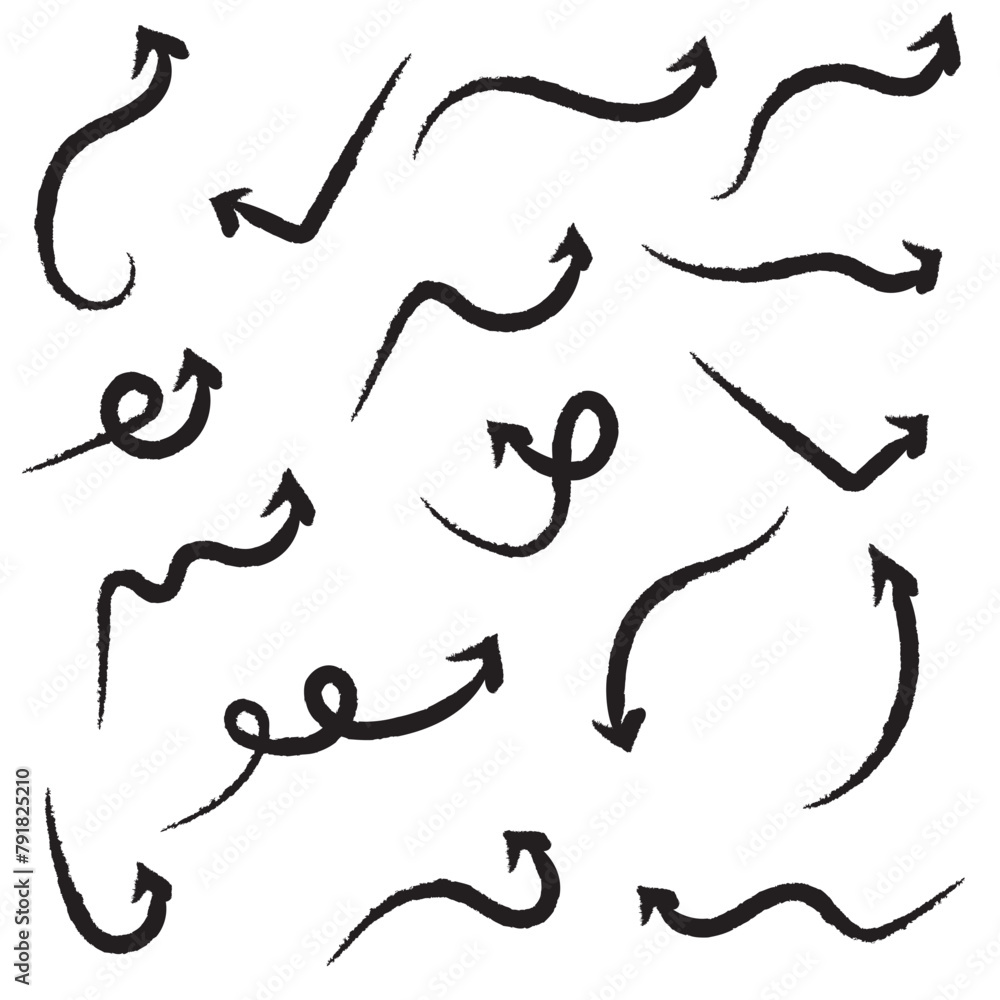 Obraz premium Black hand-drawn brush stroke arrow isolated on a white background.