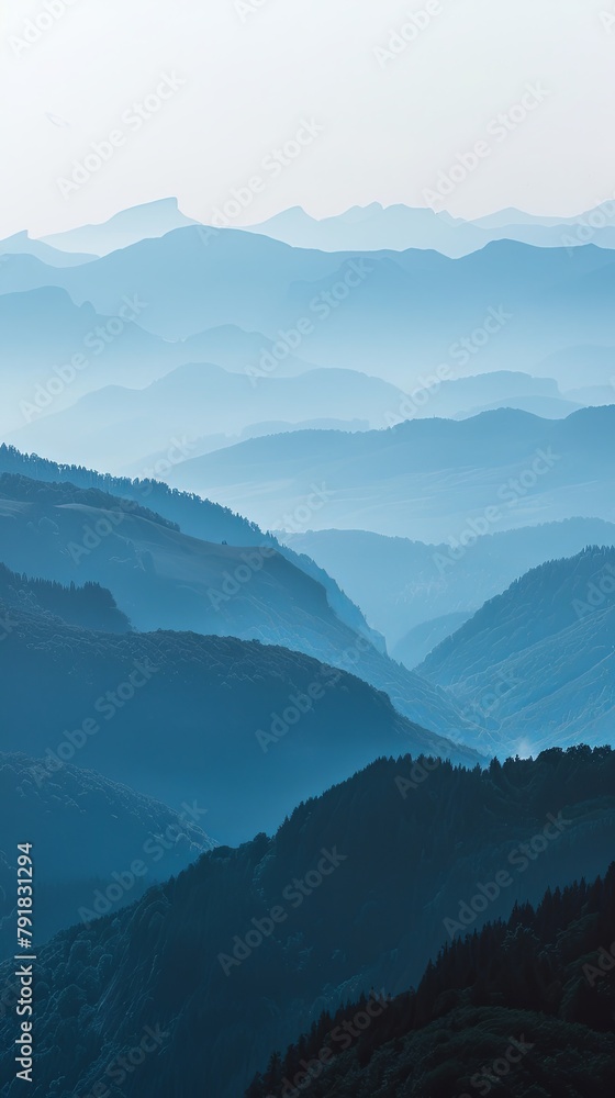 Serene Blue Mountain Range Fading into Misty Sky Serene Blue Mountain Range Fading into Misty Sky