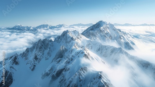 A stunning photograph of the snowcovered Andes range  showcasing breathtaking mountain scenery in New Zealand s Alps The towering peaks rise above clouds and mist.