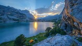 Rugged Alpine Scenery with Serene Lakeside Campsite at Sunset