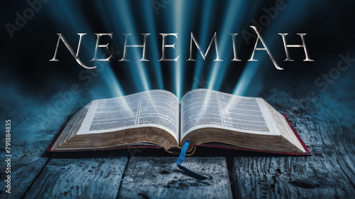 The book of Nehemiah. Open bible with blue glowing rays of light. On a wood surface and dark background. Related to this book: Rebuilding, Leadership, Restoration, Jerusalem, Wall, Exile, Faithfulness