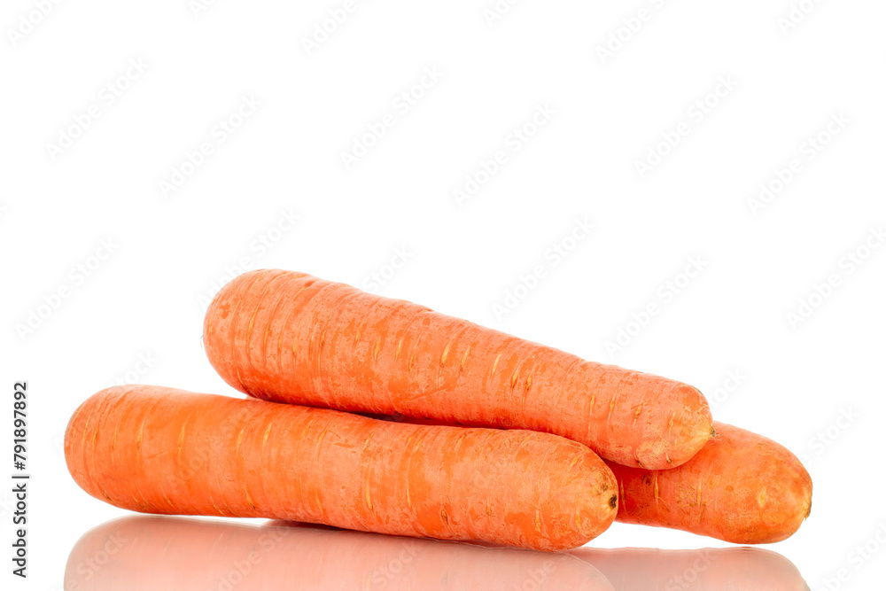 Three sweet carrots, macro, isolated on white background. Three sweet carrots, macro, isolated on white background.
