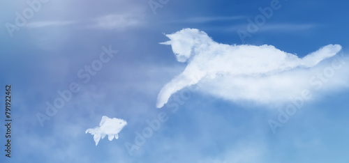 Cat clouds shape. Cat lying on a cloud catches a fish