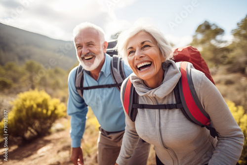 An elderly couple embarks on a scenic hike through the countryside, their backpacks filled with essentials for a day of adventure and exploration.