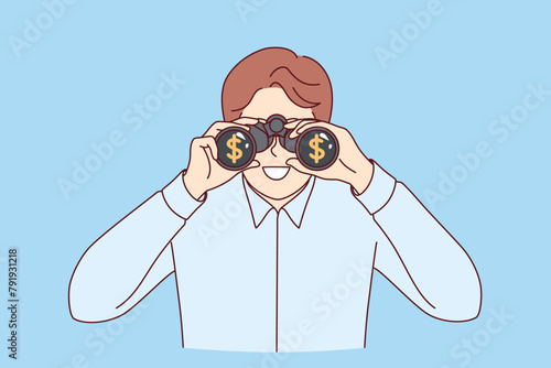 Man business detective monitors work of competitors through binoculars to increase corporate profits. Business guy looks to future and rejoices at availability of opportunities for money making