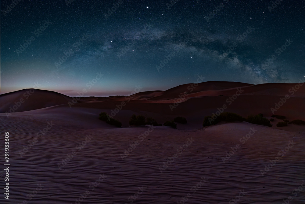 The full Milky Way arch panorama over the Abu Dhabi Desert dunes