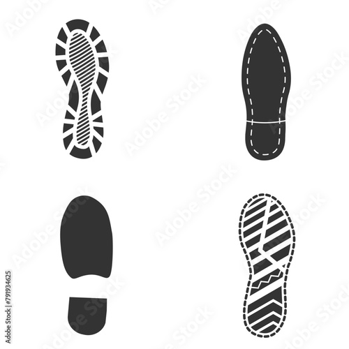 Human footprints icon set. Footprints silhouettes  shoes isolated on white background, such as idea of logo in gray. Stock vector. EPS10. © katarinanh