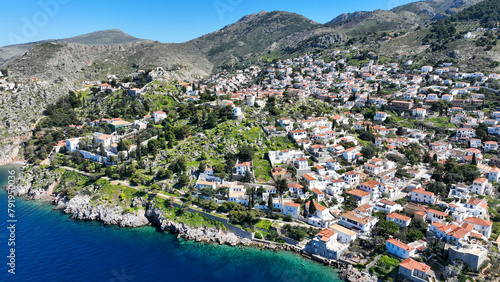 Aerial drone photo of small picturesque seaside village and harbour of Kaminia located near main village of Hydra island accessible by footpath, Saronic gulf, Greece © aerial-drone